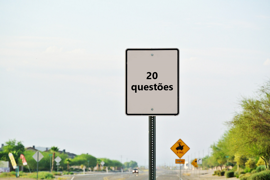 Placa de trânsito onde se lê "20 questões"